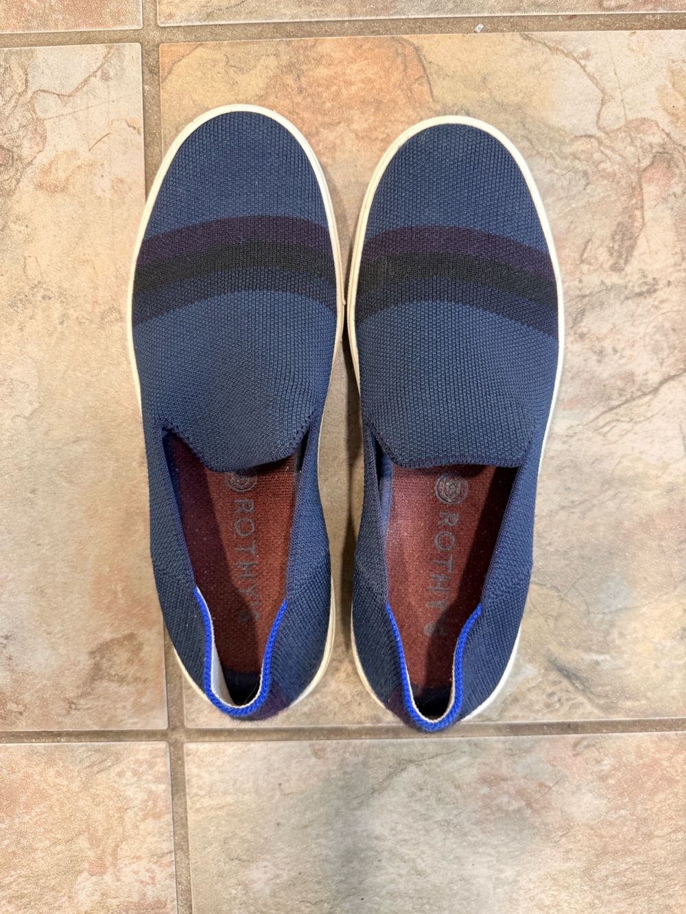 Rothy's Navy Slip-On Flats with Black and Purple Accent